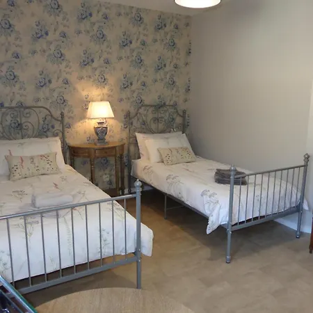 The Coachhouse Apartament *